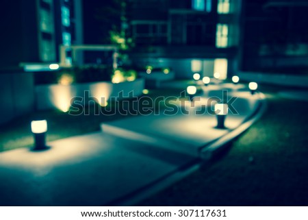 Defocused walkway in night garden background