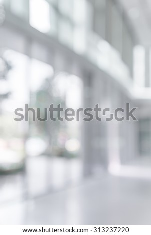 Abstract white blur background from building hallway corridor