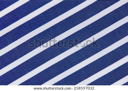 Stripy Fabric background blue and white closeup