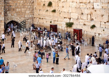 JERUSALEM, ISRAEL - JUNE 4, 2015: Western Wall also known as Wailing Wall or Kotel in Jerusalem. People from all over the world come to pray.