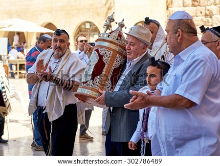 JERUSALEM, ISRAEL - JUNE 4, 2015: Jewish family Celebrates Bar Mitzvah at the Western Wall in Jerusalem. 13 years old age means the religious majority for boys.