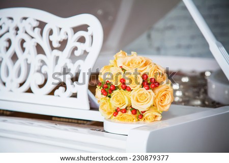 wedding flowers on piano