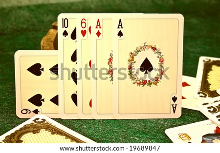 Old cards on a green background