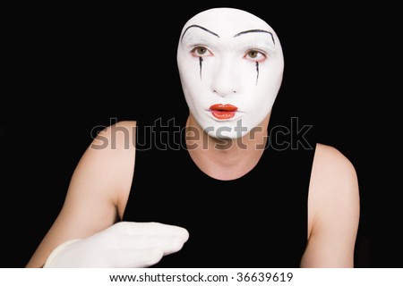 Portrait of  mime in white gloves