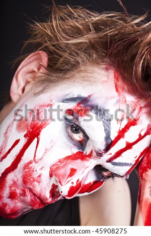 Portrait of  mime with stained  blood feca close up