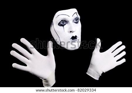 Theatre Makeup on Mime Face And Hands In White Gloves And A Theatrical Make Up Isolated
