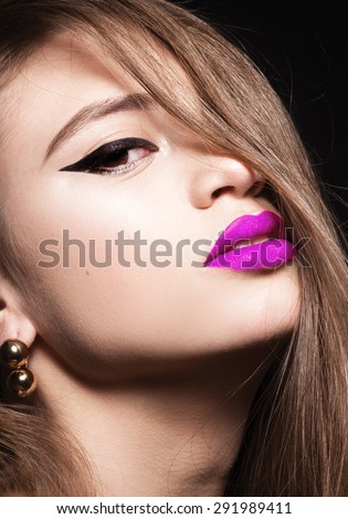 Beautiful young model woman with red lips and shine hair