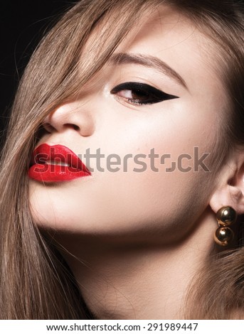 Beautiful young model woman with red lips and shine hair