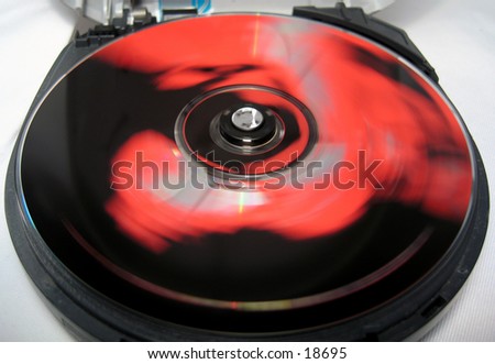 spinning compact disc in a cd player