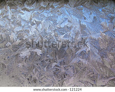 Window covered with ice. Texture of ice crystals.