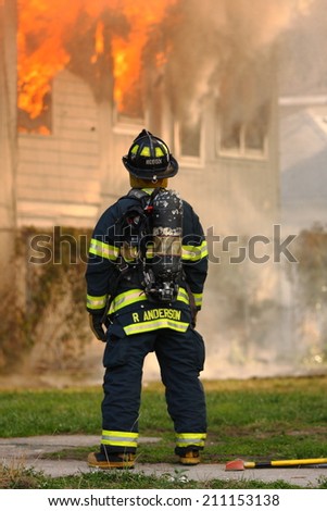 ATLANTIC CITY - July 18th: R. Anderson of the Atlantic City Fire Department responds to fire on North Providence Avenue  on July 18th 2014 in Atlantic City