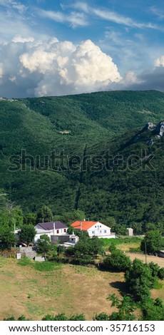 House in mountains. Village landscape.