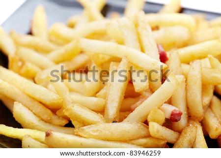 French fries on black dish