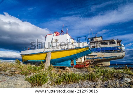 Boats under maintenance, Puerto Natales, Chile