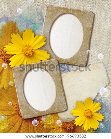 Old grunge photo frame with daisy and paper for letter