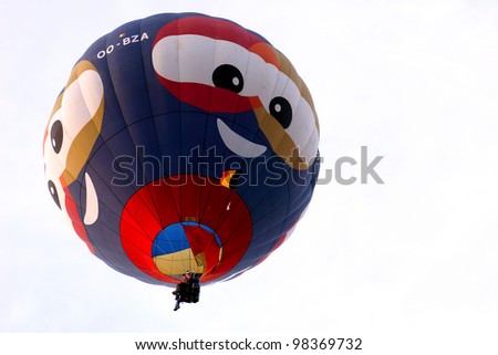 PUTRAJAYA, MALAYSIA - MAR 19 : A hot air balloon from Belgium in flight at the 4th Putrajaya International Hot Air Balloon Fiesta on 19 Mar, 2012 in Putrajaya. 23 balloons participate in this year