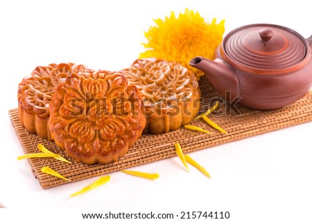 moon cake and tea for Chinese mid autumn festival. Isolated on white. Copy space