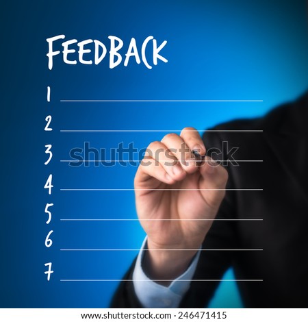 business man writing blank feedback list. business man writing feedback concept