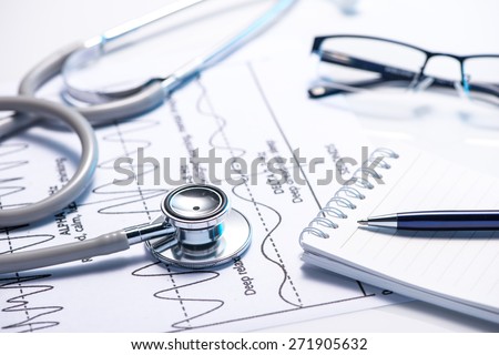 Cost of health care. Filling Medical Form, document, stethoscope