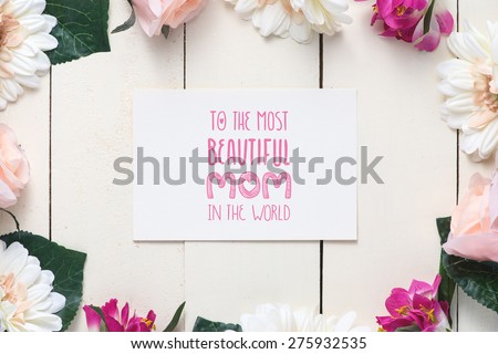 Close up of a beautiful bouquet of roses with a happy mothers day card. Mother's Day concept