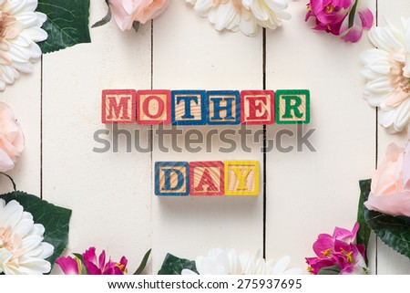 Happy Mothers Day message with scrabble letters spelling. Top view