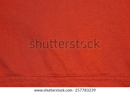 Orange synthetic fabric texture background