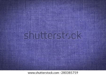 Abstract dark blue color background from synthetic fabric in black shadow