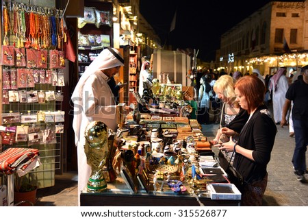 DOHA, QATAR - March 20 2014: Souq Waqif is a main marketplace selling traditional garments, spices, handicrafts, and souvenirs.