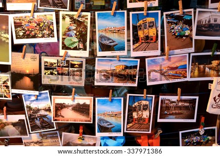 Samut Songkhram, Thailand - July 22, 2013: Postcard is a popular souvenir for tourist at Amphawa Floating Market