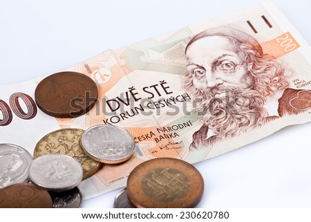 czech koruna, former czech republic banknotes and hard money on white background,