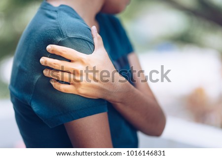 Woman with pain in shoulder and upper arm. Ache in human body