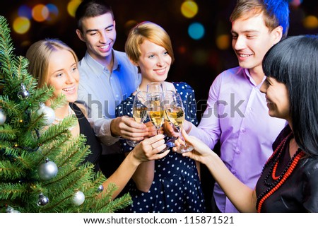 Portrait of several friends celebrating New Year