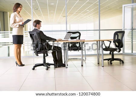 Image of businesspeople working at meeting