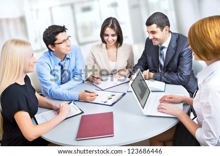 Business people working with laptop in an office
