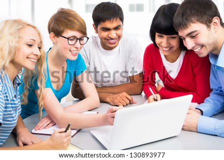 Young students studying together