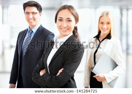 Group of business people with business woman leader on foreground