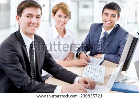 Business people working at a computers in the office