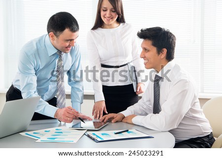 Business people working on their business project together at office