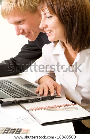 Confident business people doing some computer work together