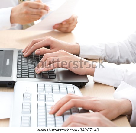 Human hands doing some computer work