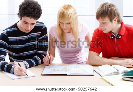 Portrait of a young group of students paying attention in class