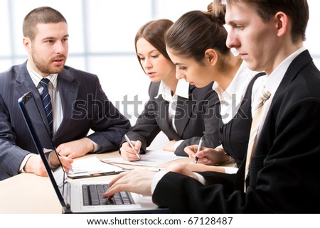 Business people at a meeting in a  modern office environment