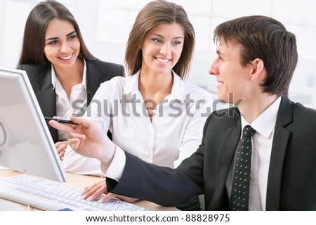 Smiling business people  in board room - Staff meeting