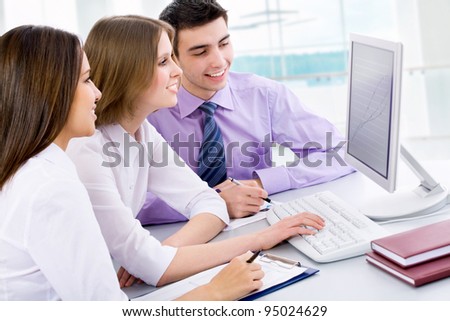 Business people working at a computers in the office