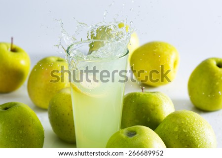 Green apple juice splash