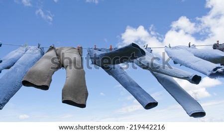 clothes drying rack blue background