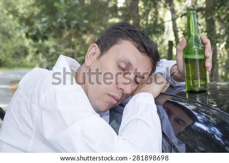 Drink and drive man with alcohol in car