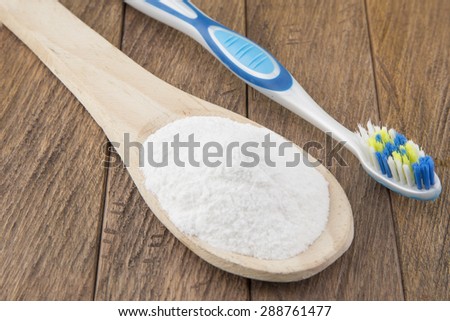 Toothbrush and baking soda to clean