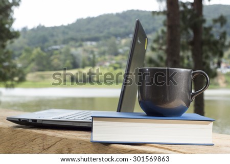Laptop, book and coffee