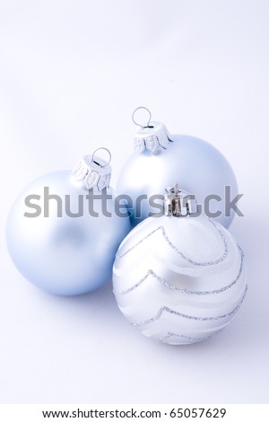 Silver christmas balls on white  background